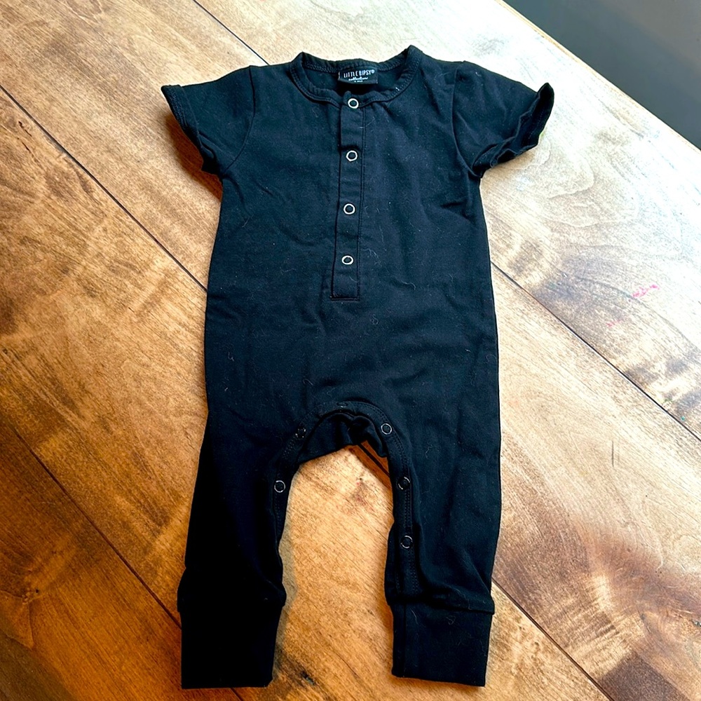 Little Bipsy black one piece romper